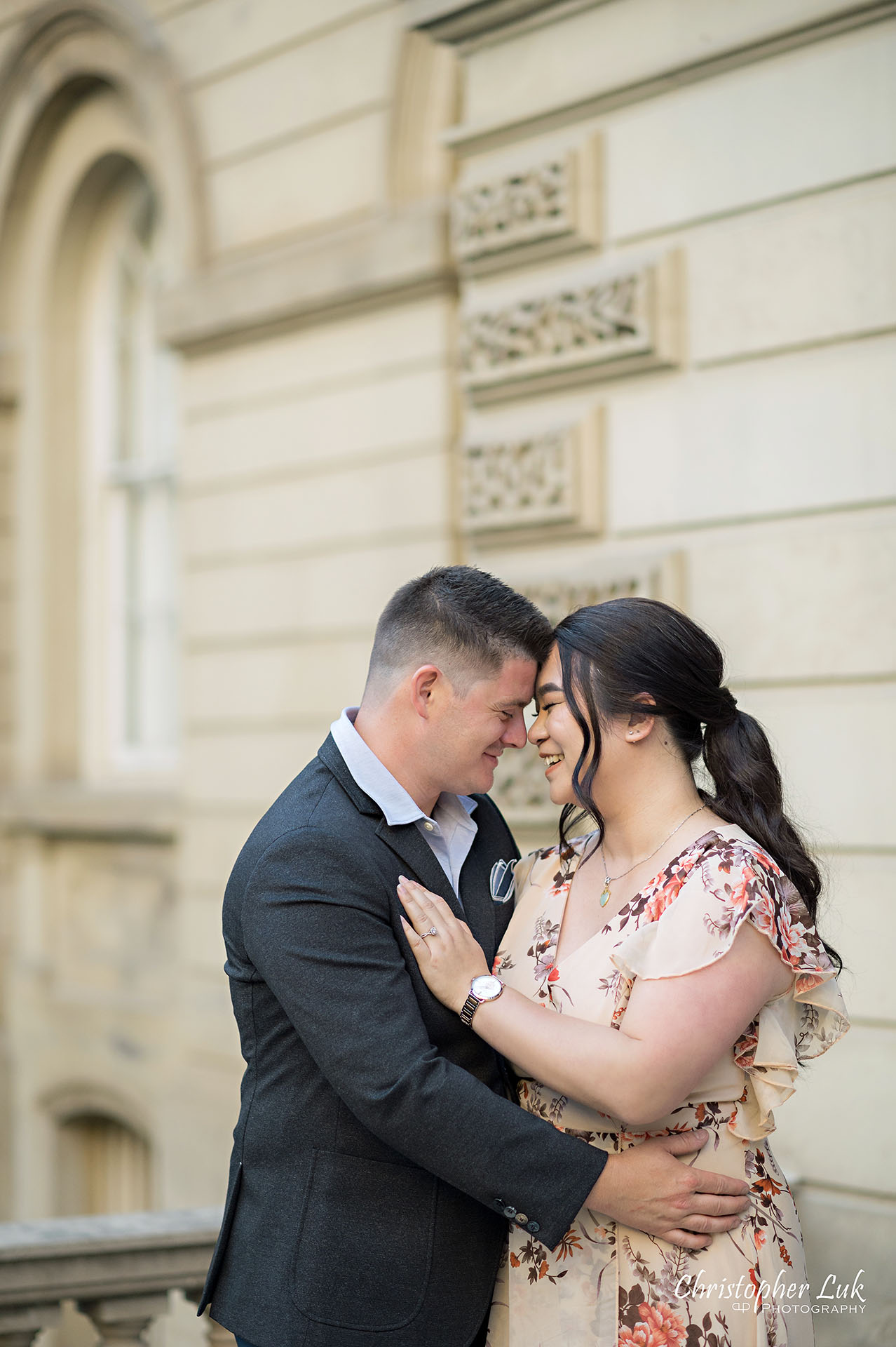 Christopher Luk Toronto Wedding Photographer Engagement Photos Pictures Session Osgoode Hall Nathan Philips Square City Hall Bride Groom Natural Candid Photojournalistic Organic Sunset Hug Hold Each Other Intimate Portrait