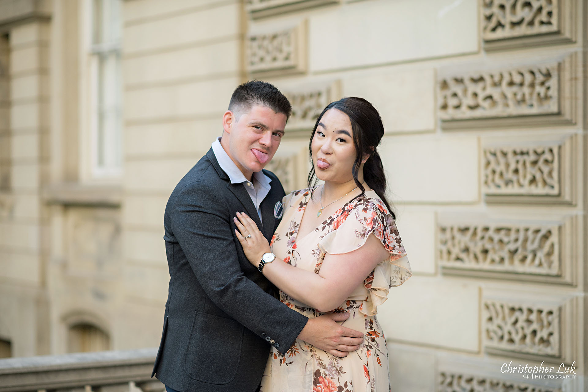 Christopher Luk Toronto Wedding Photographer Engagement Photos Pictures Session Osgoode Hall Nathan Philips Square City Hall Bride Groom Natural Candid Photojournalistic Organic Sunset Funny Silly Faces Sticking Tongue Out Landscape