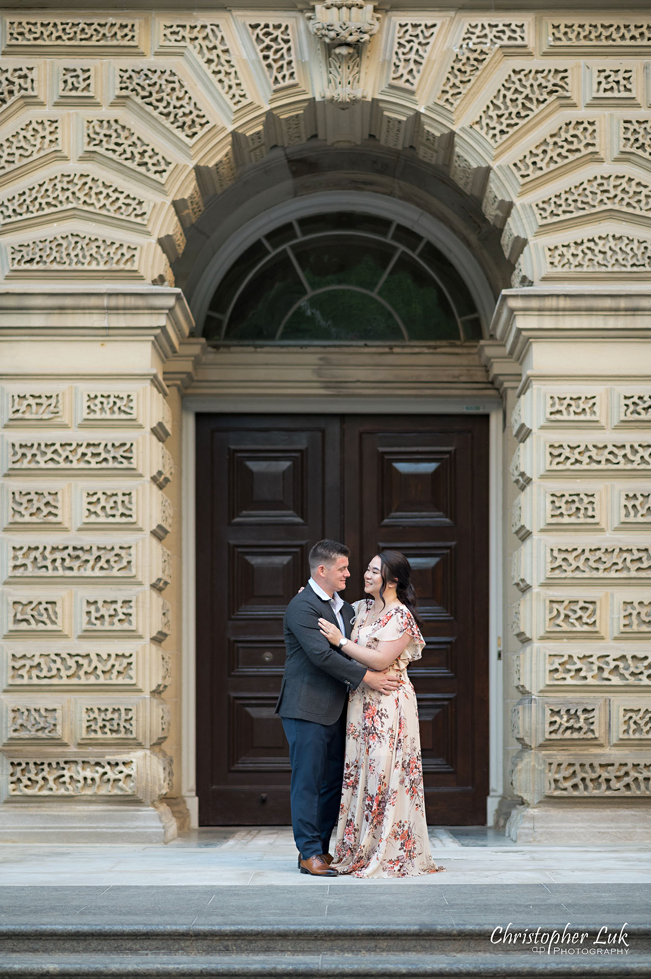 Christopher Luk Toronto Wedding Photographer Engagement Photos Pictures Session Osgoode Hall Nathan Philips Square City Hall Bride Groom Natural Candid Photojournalistic Organic Sunset Hug Hold Arch Archway Portrait