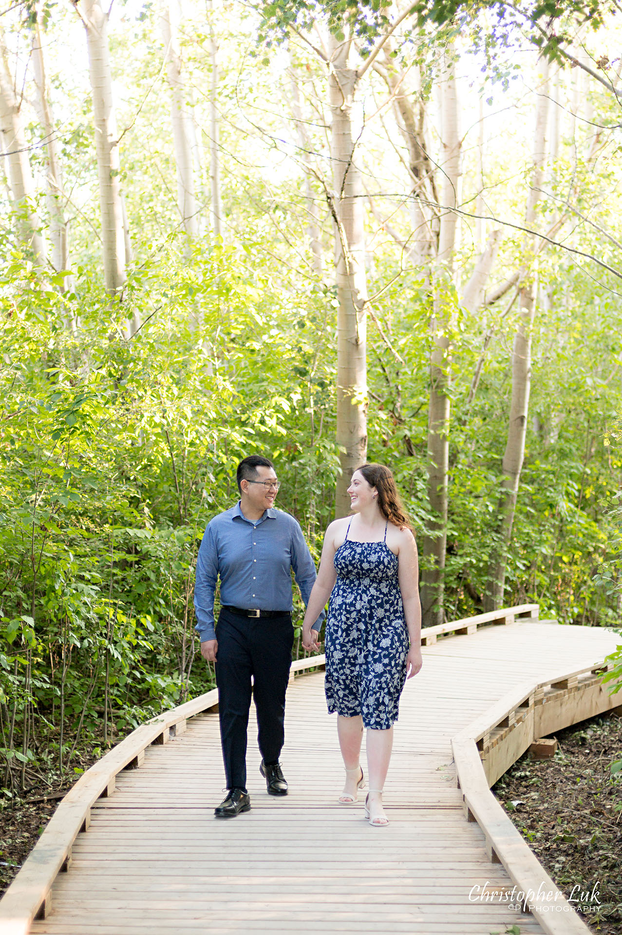 Christopher Luk Toronto Wedding Photographer Markham Forest Engagement Photos Pictures Session Bride Groom Boardwalk Walking Together Holding Hands Candid Natural Organic Photojournalistic Portrait