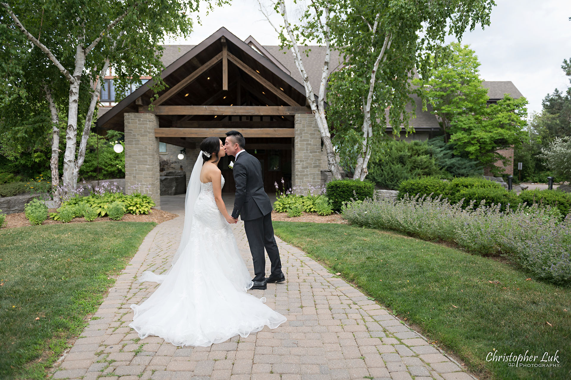 Toronto Wedding Photography Candid Natural Photojournalistic Organic Bride Groom Manor Entrance Kiss