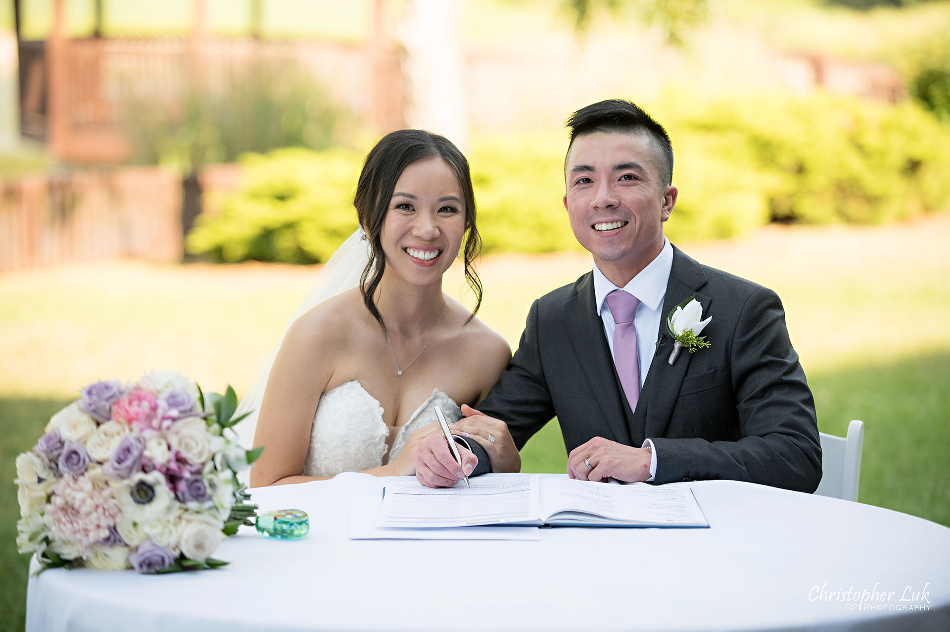 Toronto Wedding Photography The Manor Elizabeth Hall Tent Ceremony Bride Groom Signing Register Document Smile