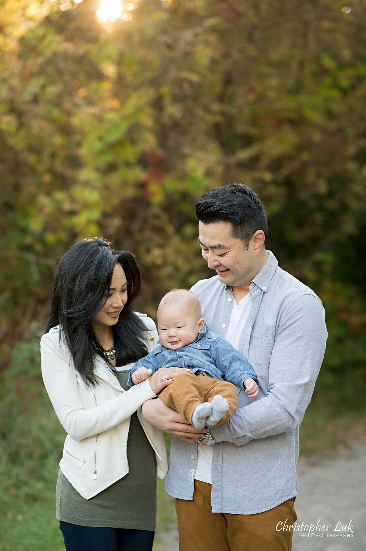 Mother Father Husband Wife Son Baby Autumn Fall Leaves Markham Unionville Toronto Family Photographer
