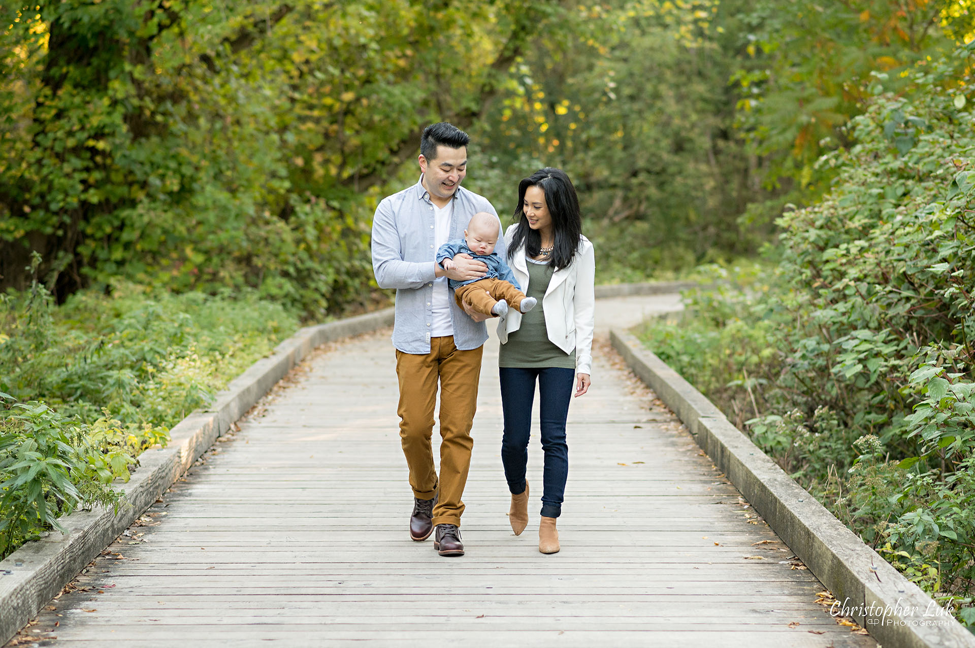 Mother Father Husband Wife Son Baby Boardwalk Autumn Fall Leaves Markham Unionville Toronto Family Photographer