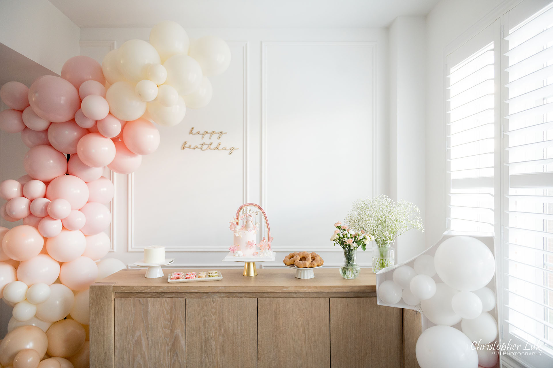 Toronto Family Baby's First Birthday Party Pink Balloon Arch Custom Cake Macarons Japanese Mochi Donuts Decor Wide