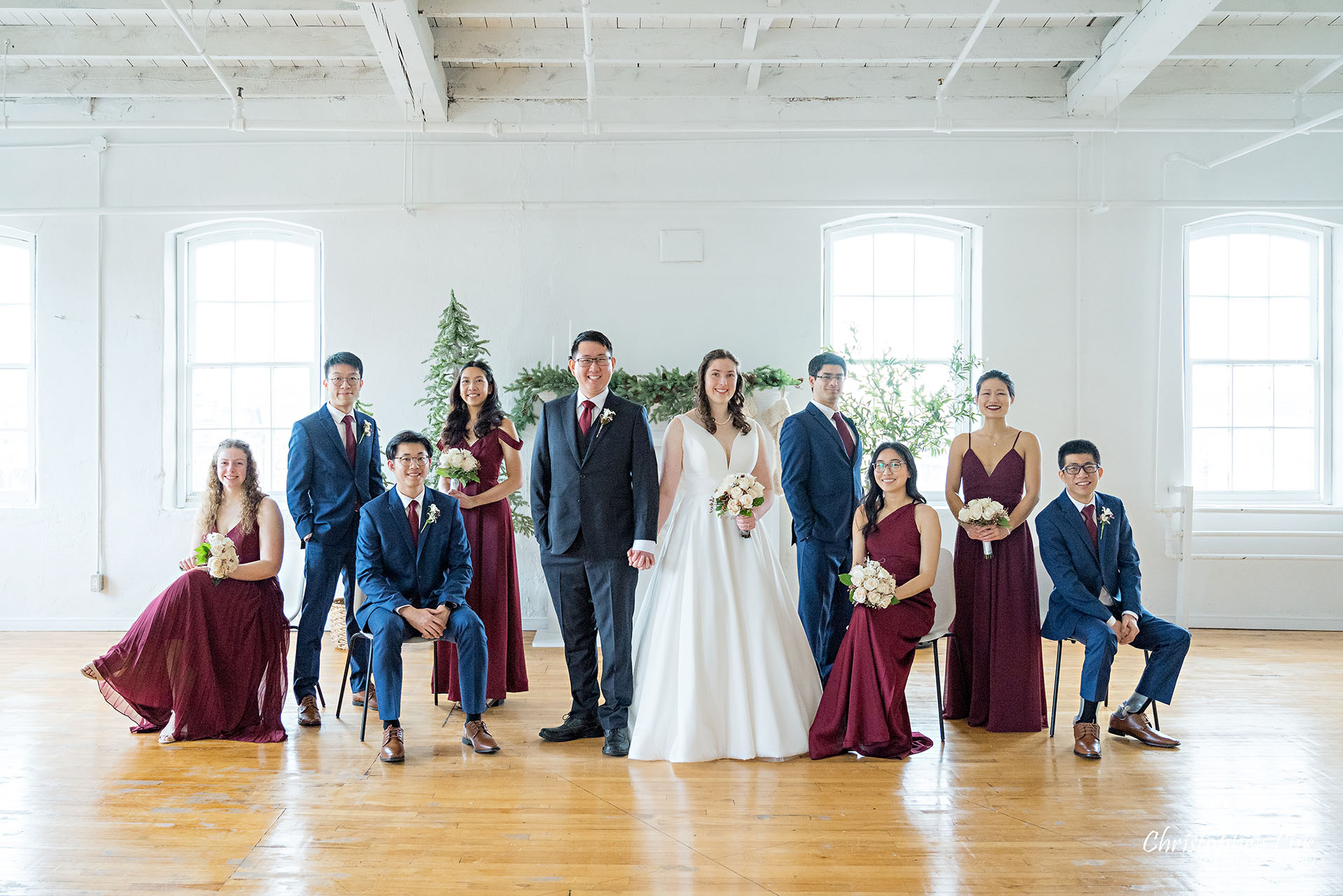 Wedding Party Bridal Bride Groom Bridesmaids Groomsmen Stylized Group Photo Vintage White Loft Studio Kitchener Waterloo Winter Christmas Landscape Smile