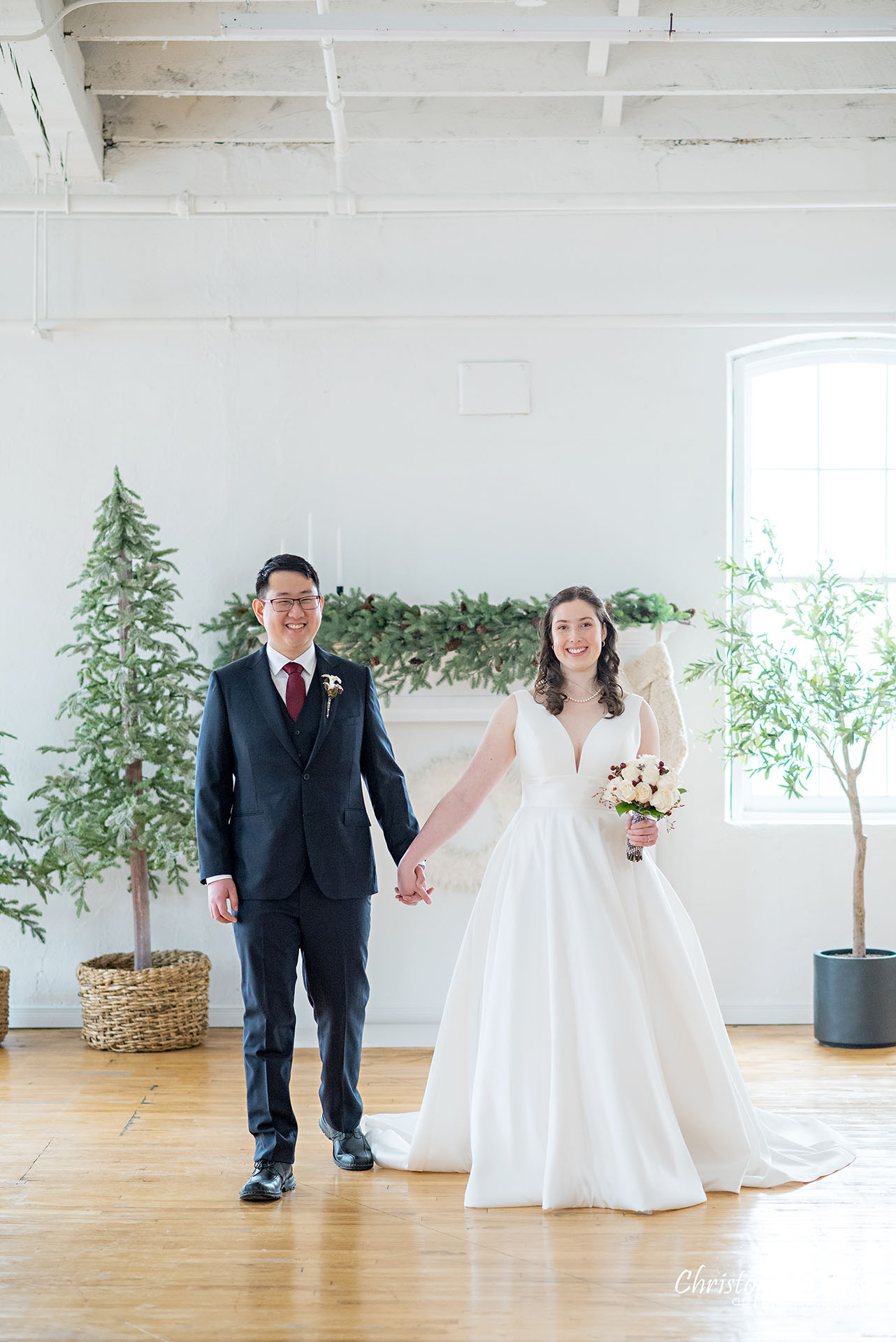 Bride Groom Vintage White Loft Studio Kitchener Waterloo Winter Christmas Natural Candid Photojournalistic Happy Smile Portrait Holding Hands Walking Together