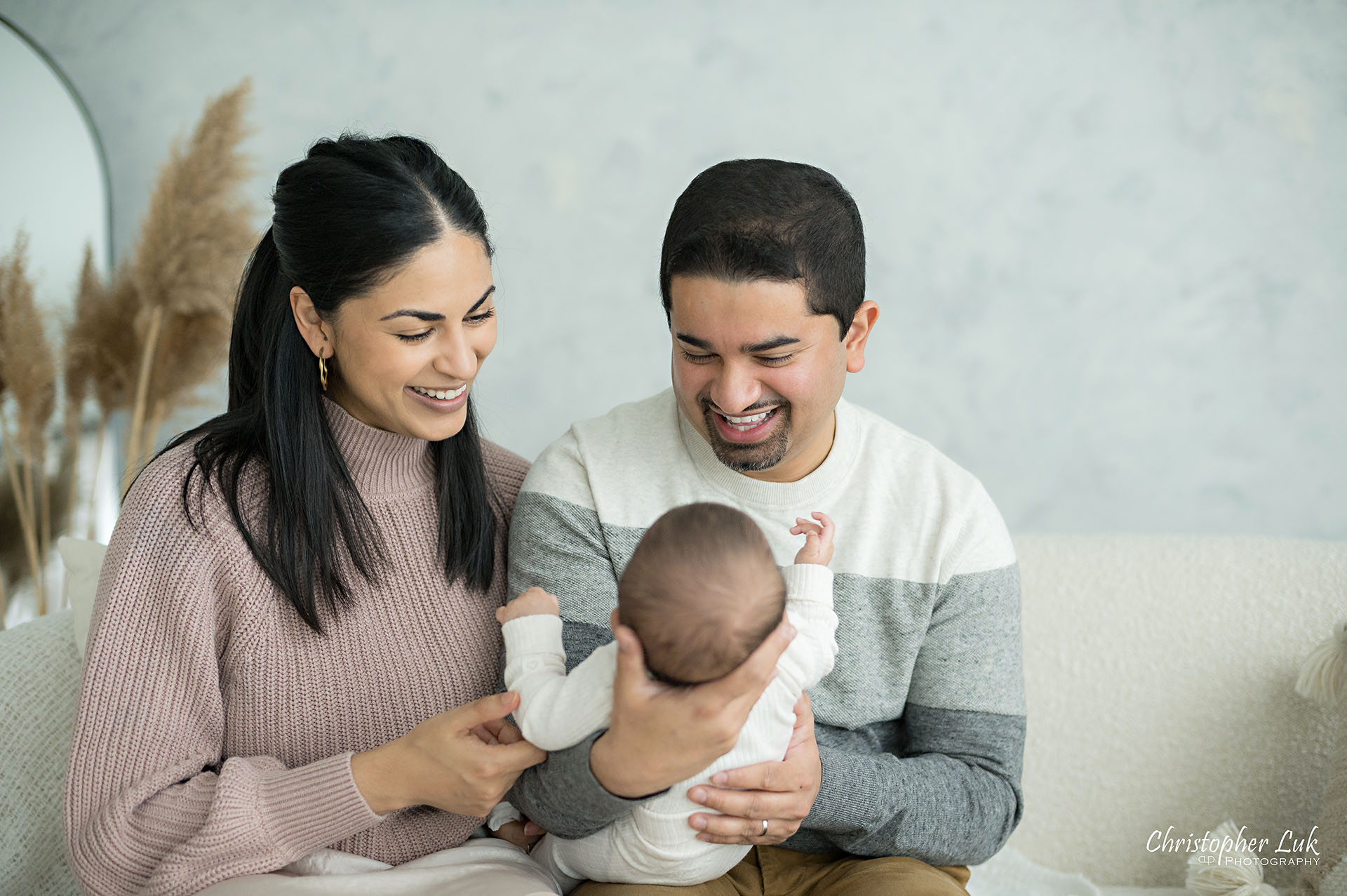 Mom Mommy Motherhood Mother Dad Daddy Fatherhood Father Holding Baby Candid Natural Photojournalistic Smile Landscape Reaction