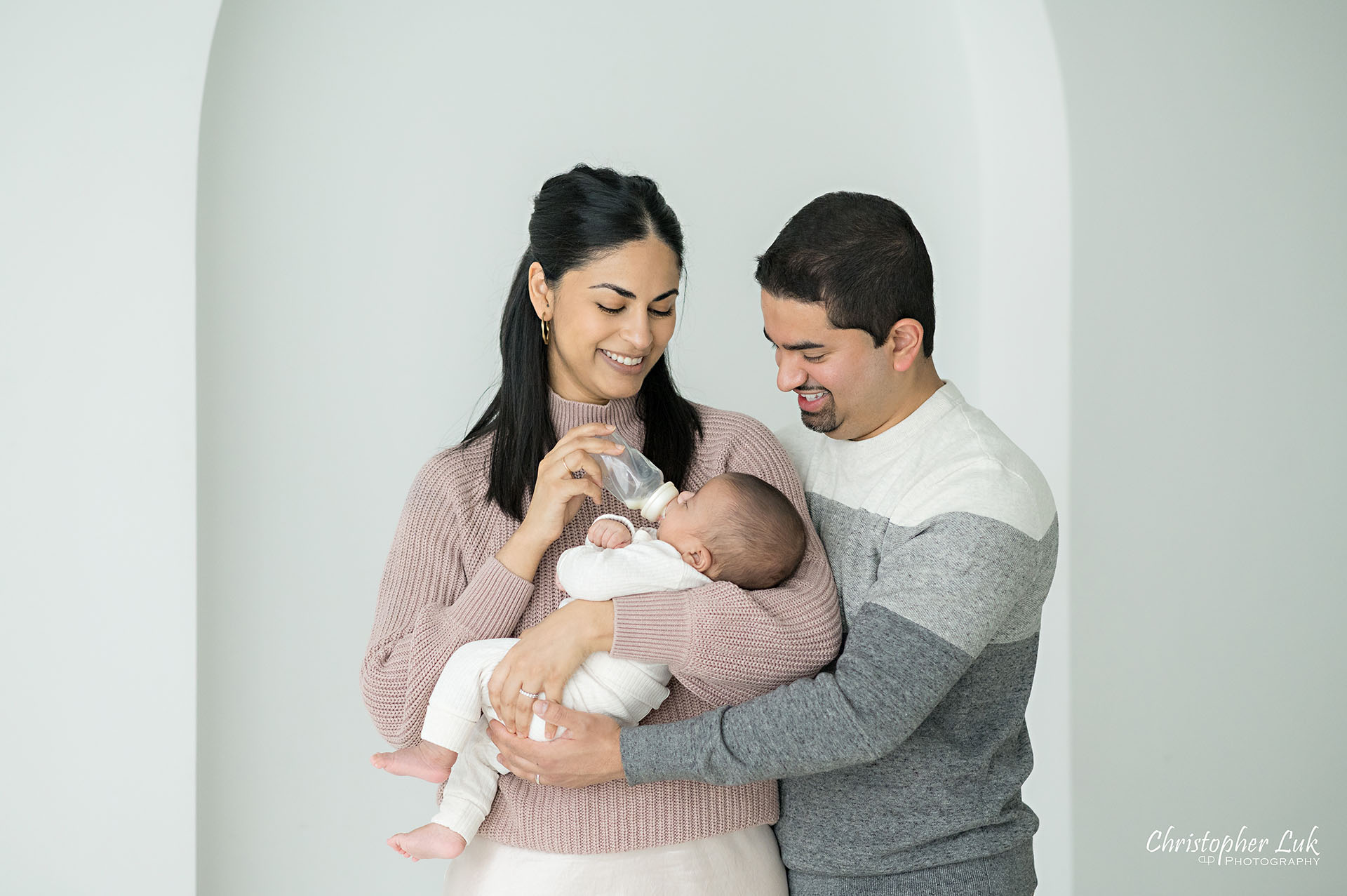 Cute Baby Boy Bottle Feeding Milk Mommy Daddy Smile