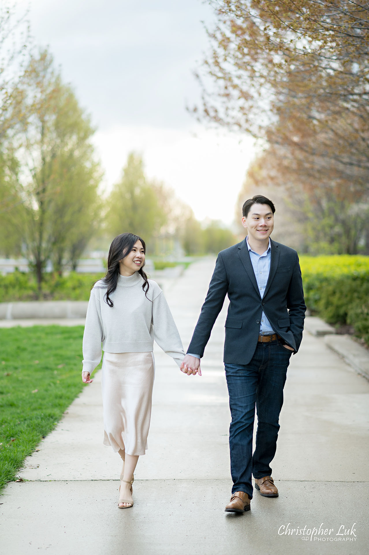 Bride Groom Engagement Session Candid Natural Organic Photojournalistic Holding Hands Walking Together Path Smile Portrait
