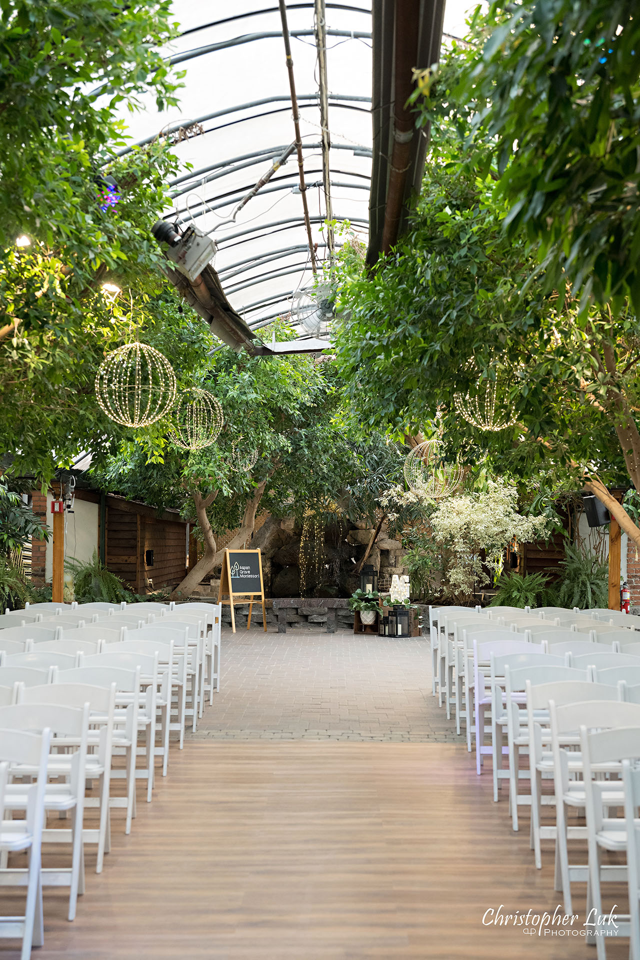 Madison Greenhouse Newmarket Event Toronto Wedding Photographer Fig Room Wide Landscape Waterfall Trees Backdrop String Lights