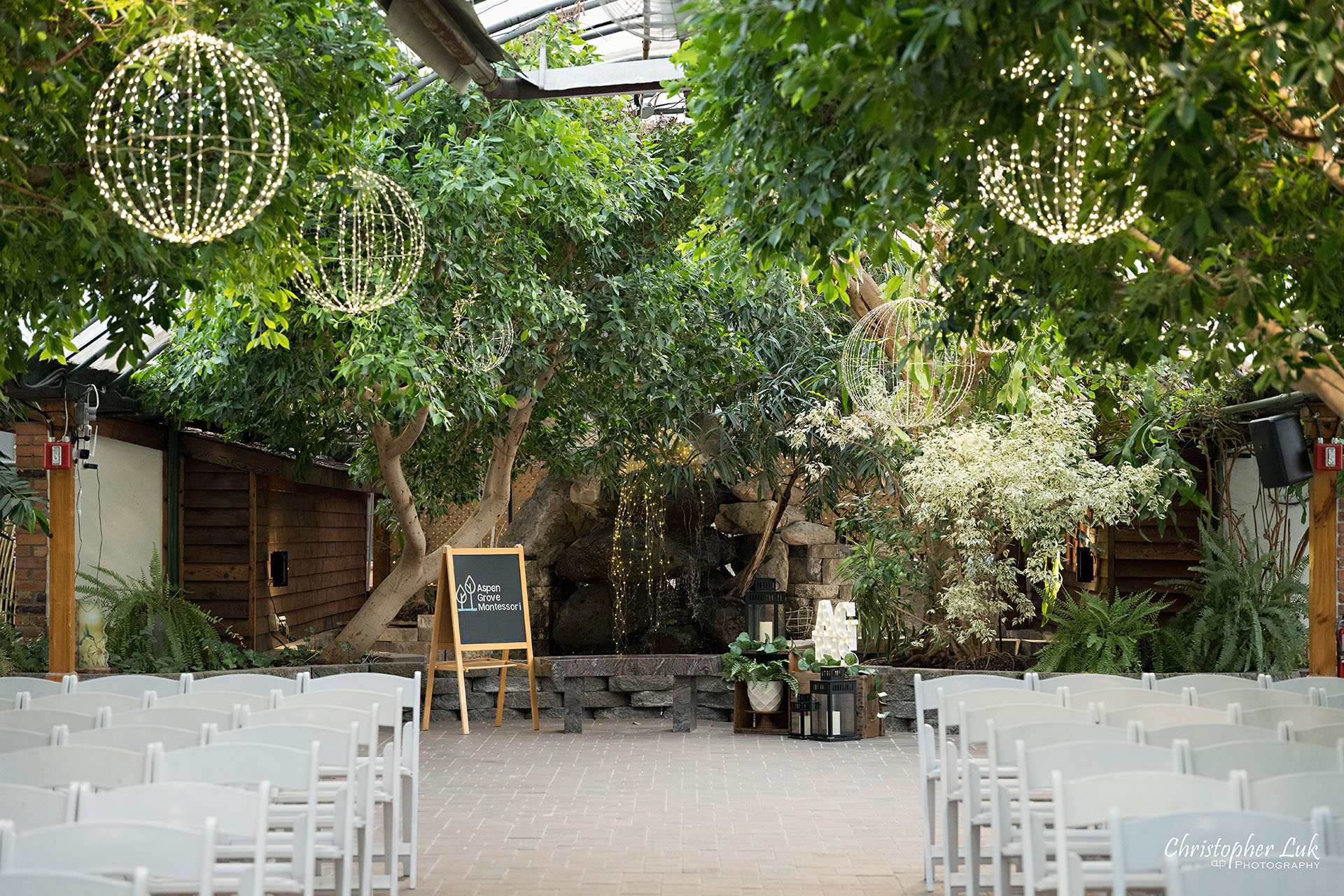 Madison Greenhouse Newmarket Event Toronto Wedding Photographer Fig Room Detail Landscape Waterfall Trees Backdrop String Lights