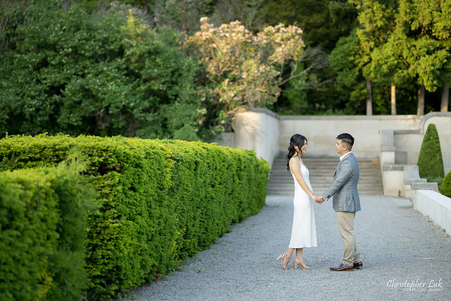 Parkwood Estate Bride Groom Engagement Session Formal Gardens Candid Natural Photojournalistic Organic Holding Hands Walking Together