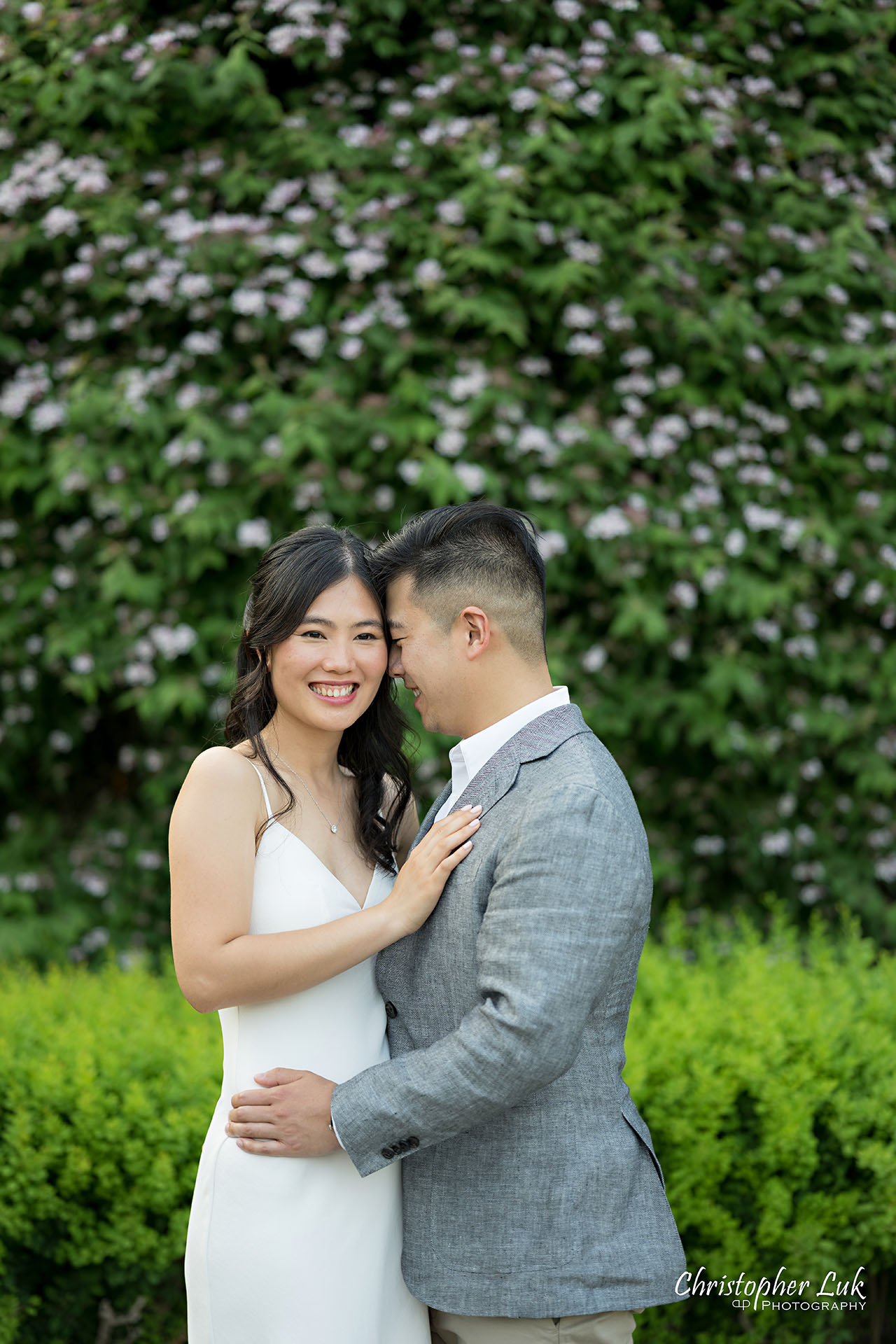 Parkwood Estate Bride Groom Engagement Session Formal Gardens Candid Natural Photojournalistic Organic Intimate Interacting Hug Laugh Portrait