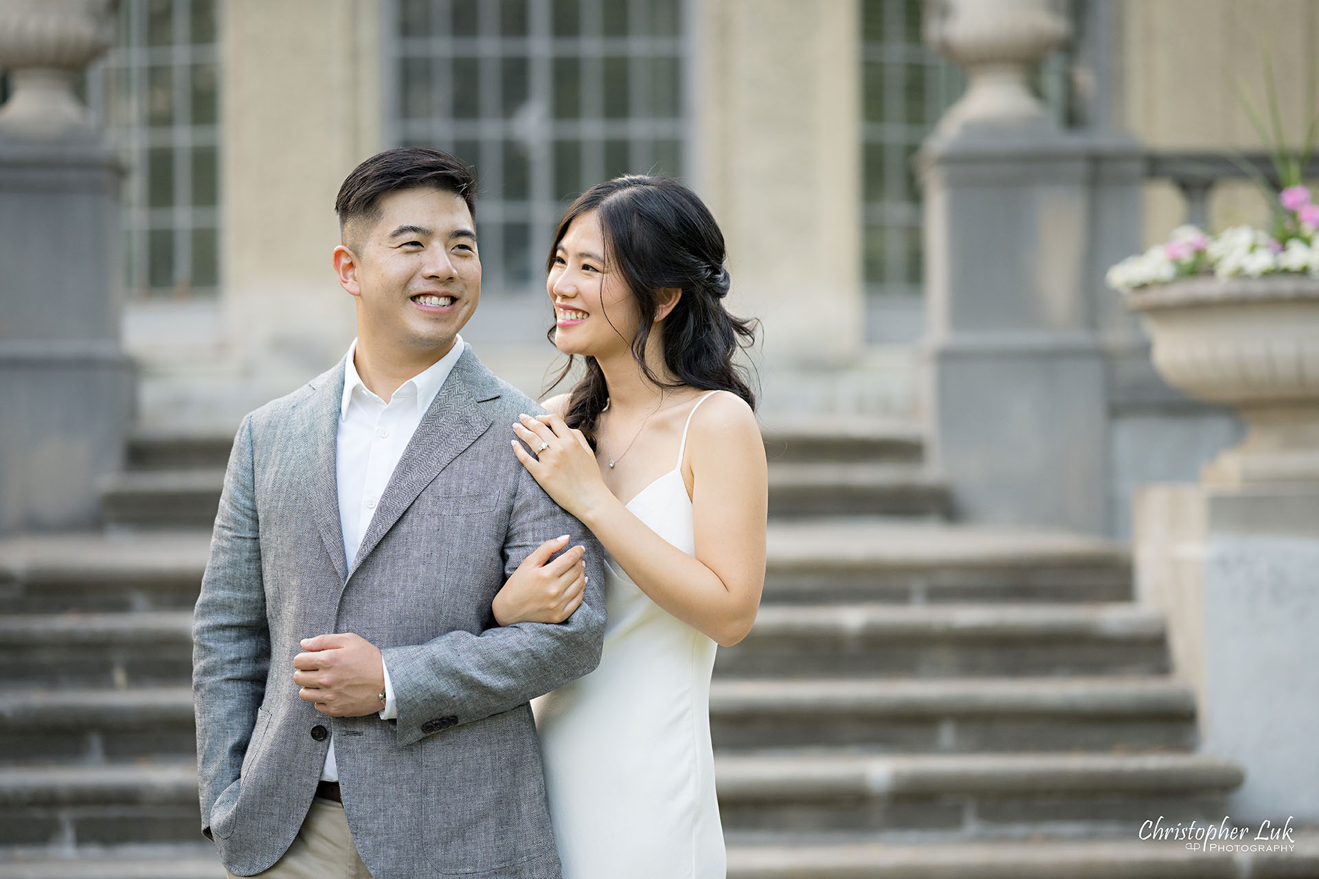 Parkwood Estate Bride Groom Engagement Session Main Lawn Garden Landscape Photojournalistic Candid Natural Organic Hug Interacting Linking Arms Smile Laugh Happy 