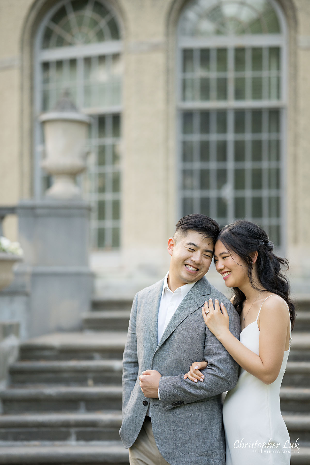 Parkwood Estate Bride Groom Engagement Session Main Lawn Garden Landscape Photojournalistic Candid Natural Organic Hug Intimate Linking Arms Smile Laugh Happy 