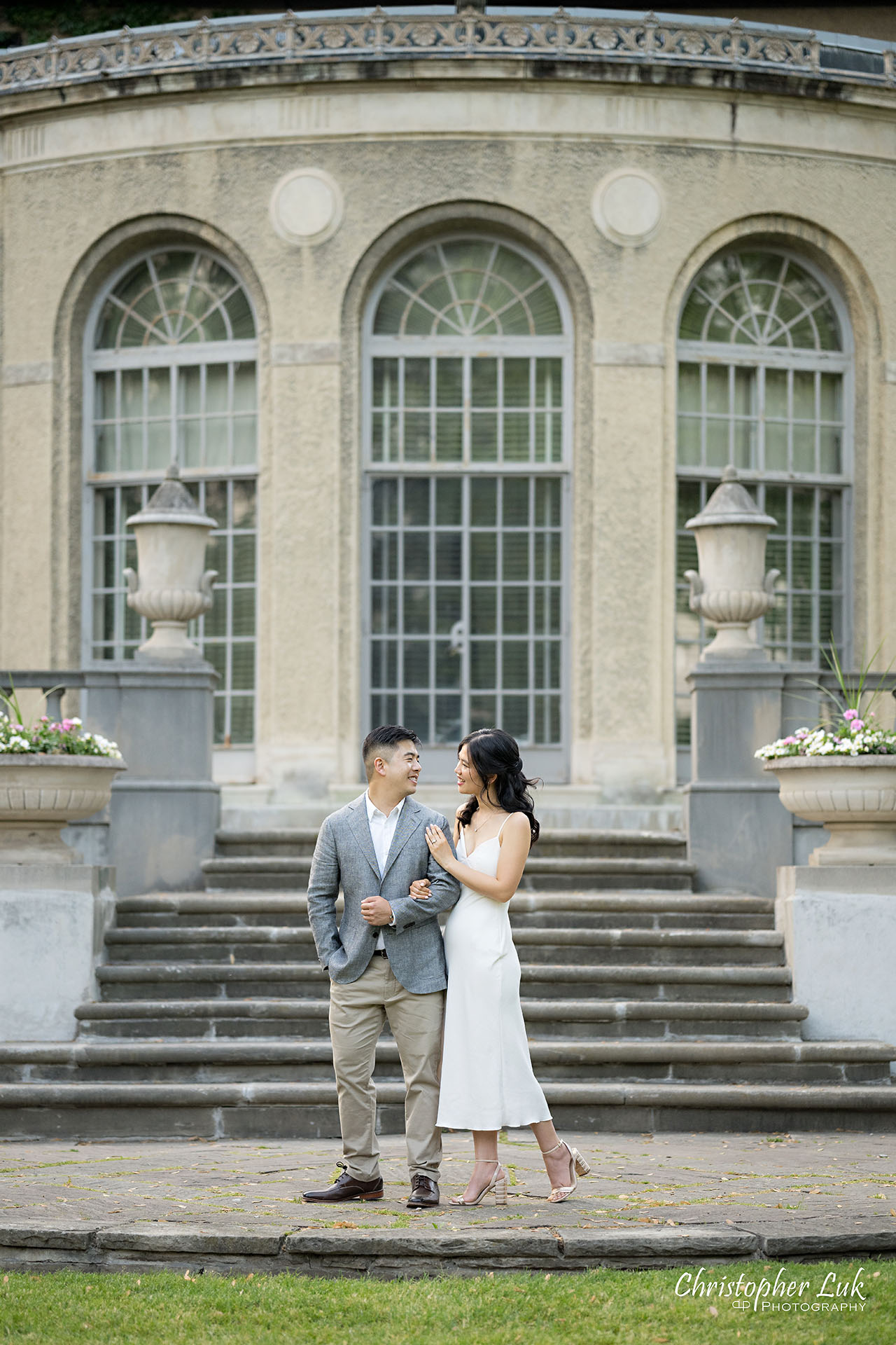 Parkwood Estate Bride Groom Engagement Session Main Lawn Garden Landscape Photojournalistic Candid Natural Organic Hug Interacting Linking Arms Smile Laugh Happy 