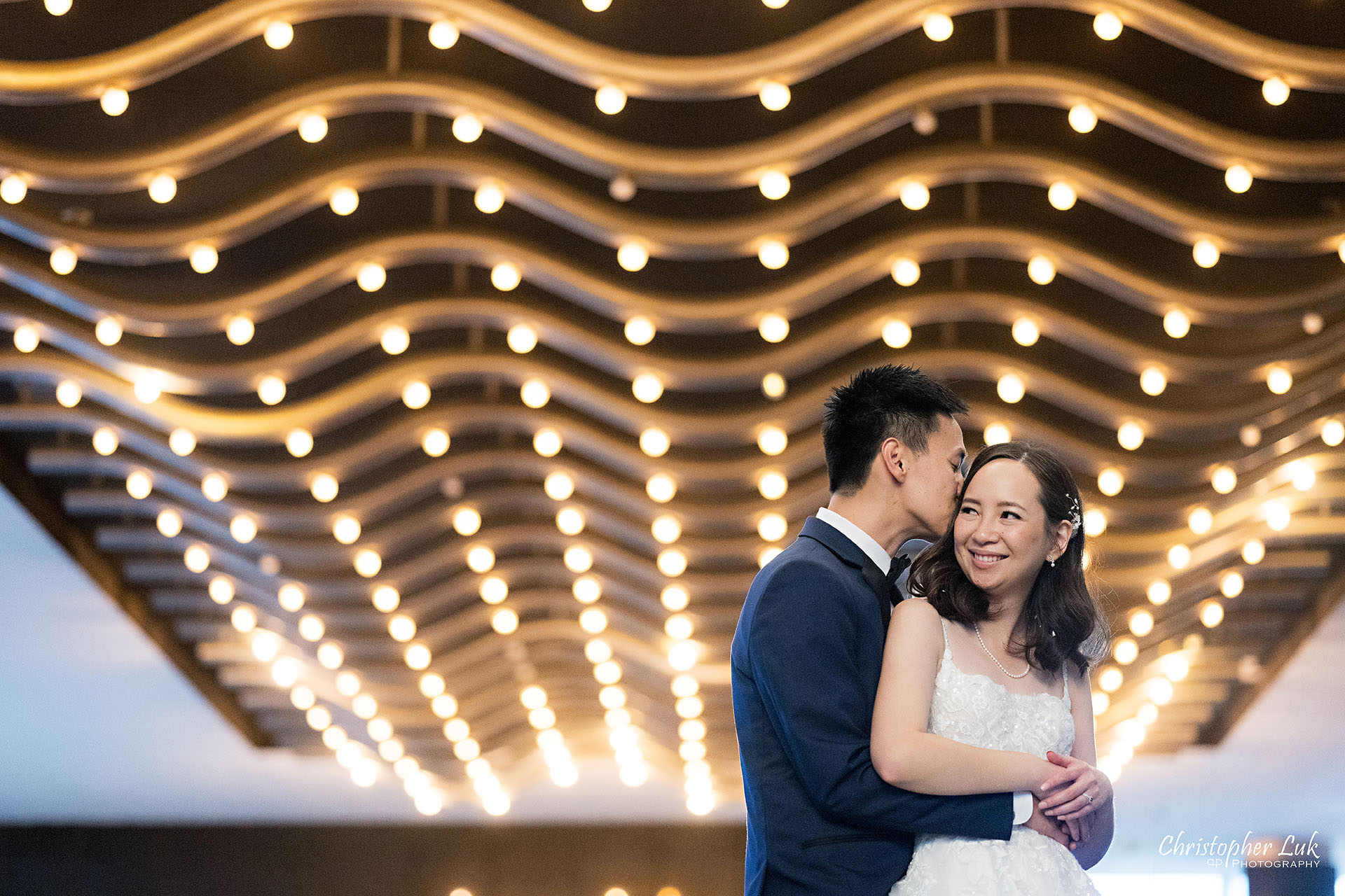 Bride Groom Creative Portrait Session Natural Candid Photojournalistic Organic Hugging Holding Each Other Intimate Smile Sparkling Twinkling Marquee Lights