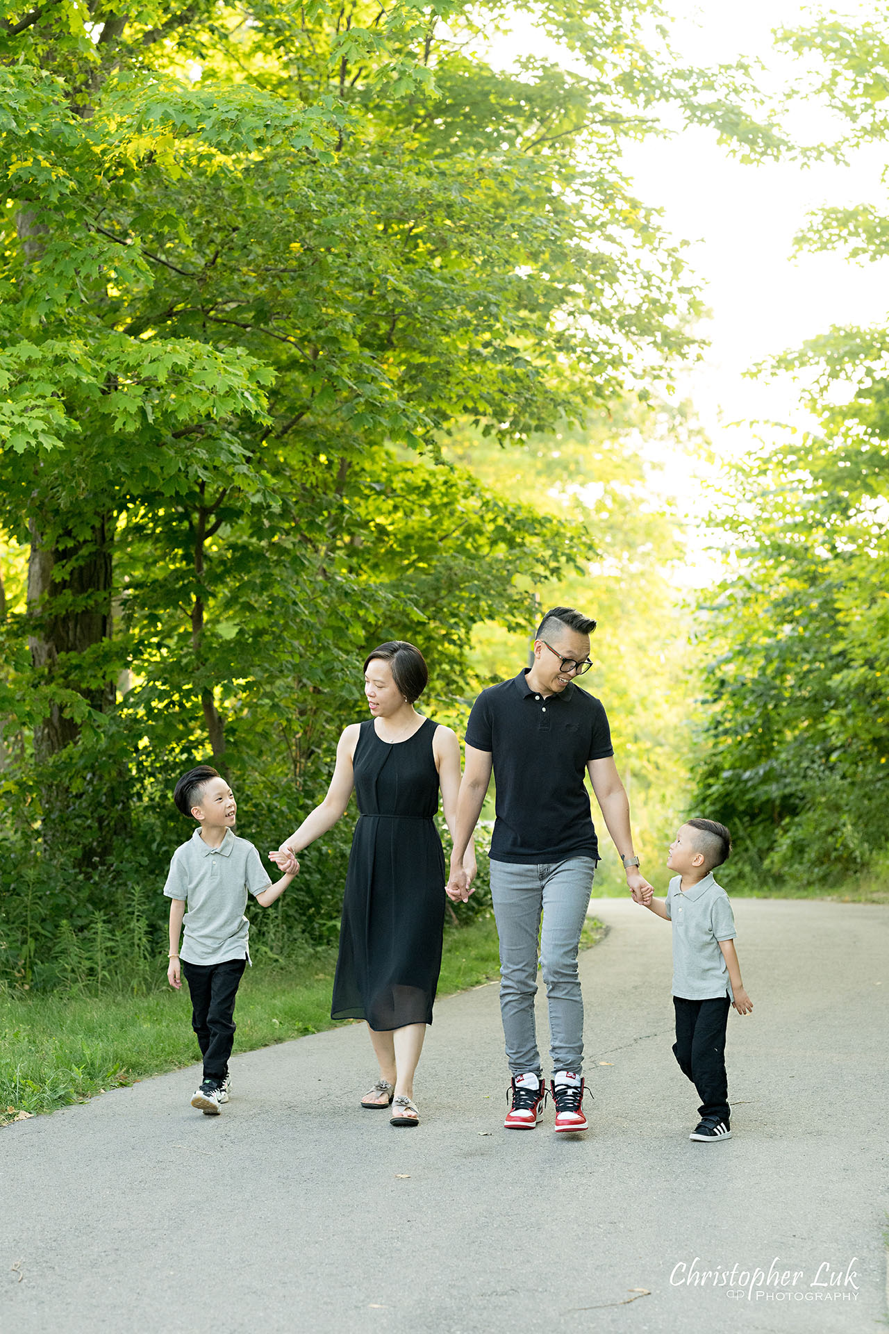 Toronto Woodbridge Vaughan Family Photographer Christopher Luk Candid Natural Photojournalistic Organic Happy Joyful Mother Father Children Sons Brothers Holding Hands Walking Together Portrait