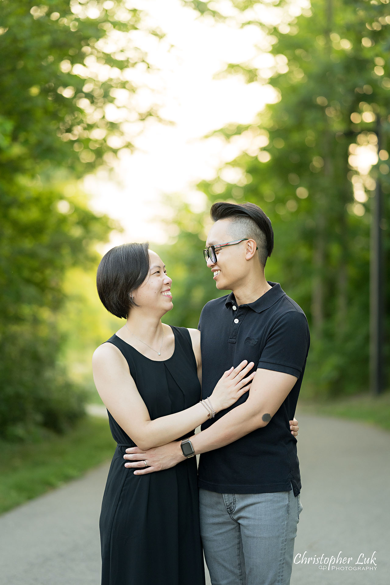 Toronto Woodbridge Vaughan Family Photographer Christopher Luk Candid Natural Photojournalistic Organic Happy Joyful Mother Father Husband Wife Hugging Holding Each Other Portrait