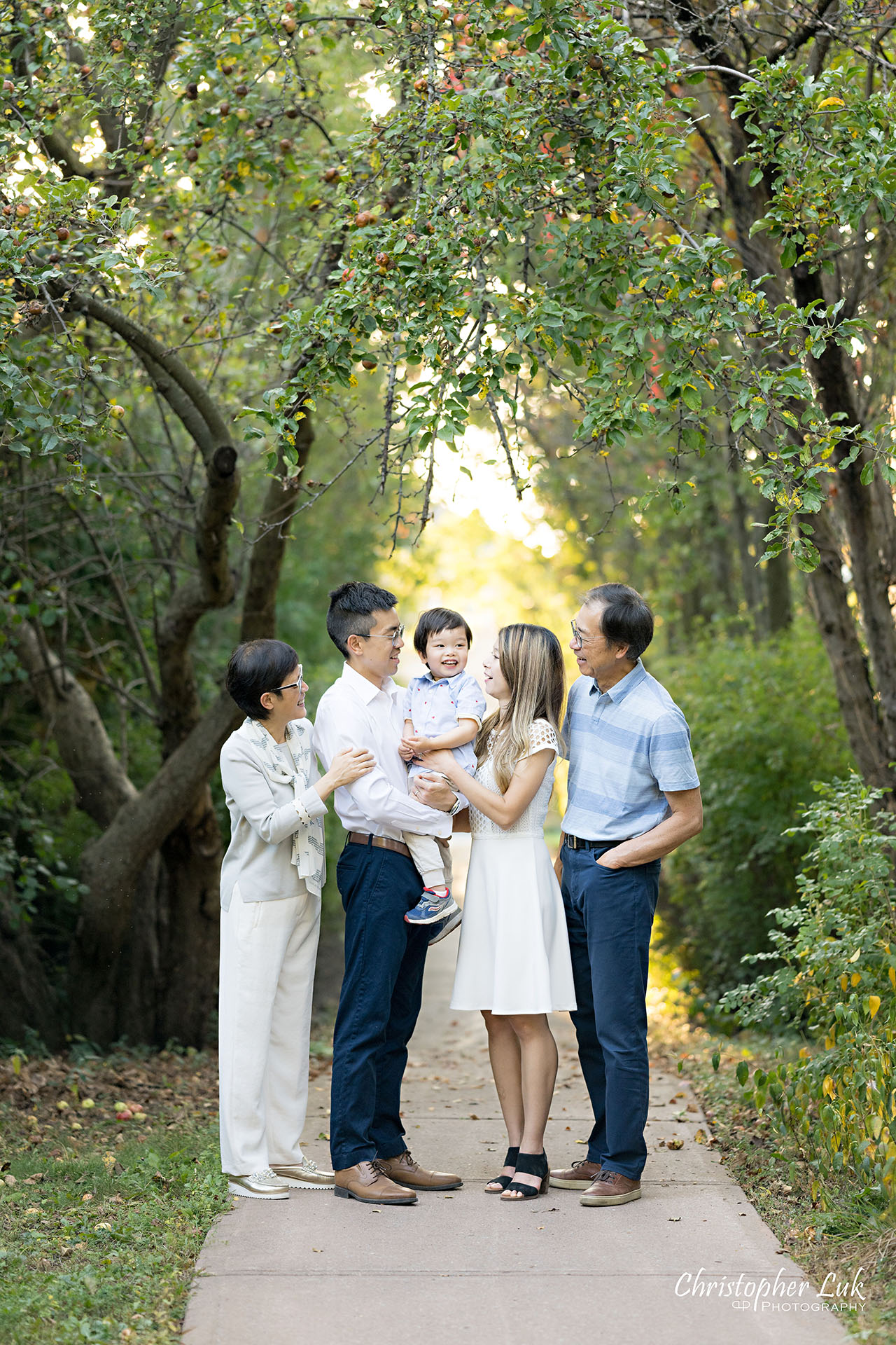 Christopher Luk Markham Family Photographer Photojournalistic Candid Natural Organic Grandparents Grandmother Grandma Grandfather Grandpa Grandchild Grandson Extended Family Husband Wife Mom Dad Son Hug Smile Portrait