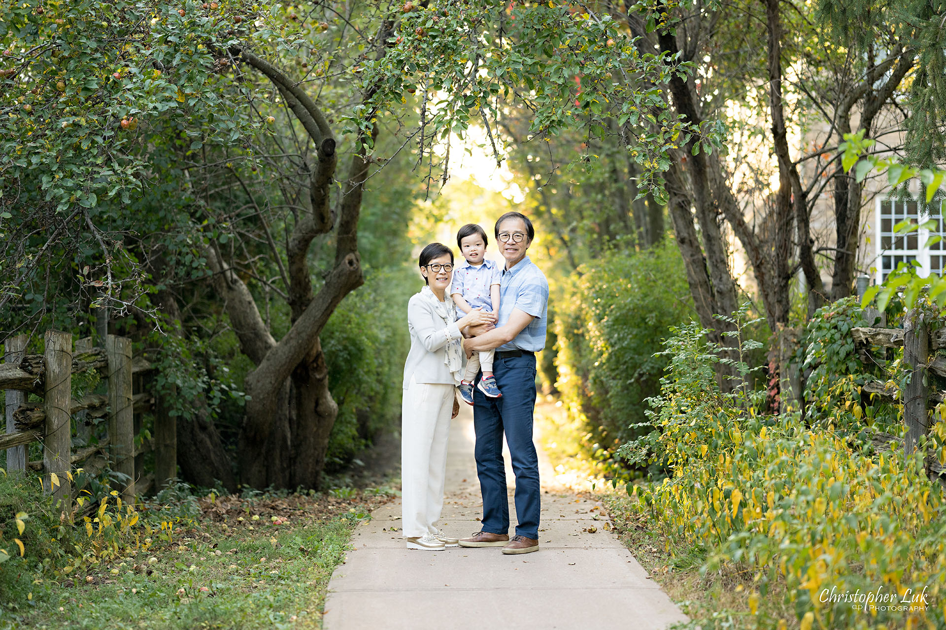 Christopher Luk Markham Family Photographer Photojournalistic Candid Natural Organic Grandparents Grandmother Grandma Grandfather Grandpa Grandchild Grandson Hug Smile Landscape