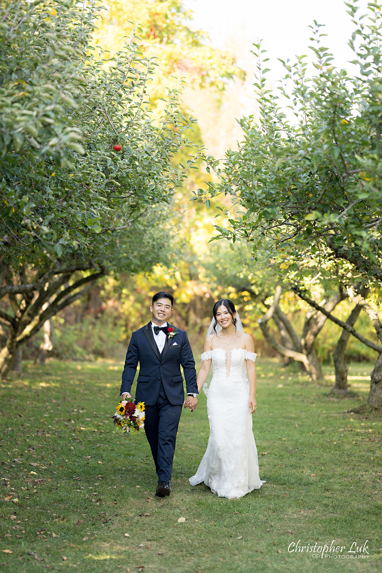 Markham Museum Apple Orchard Applefest Bride Groom Wedding Natural Candid Photojournalistic Organic Holding Hands Walking Together Smile Happy Portrait