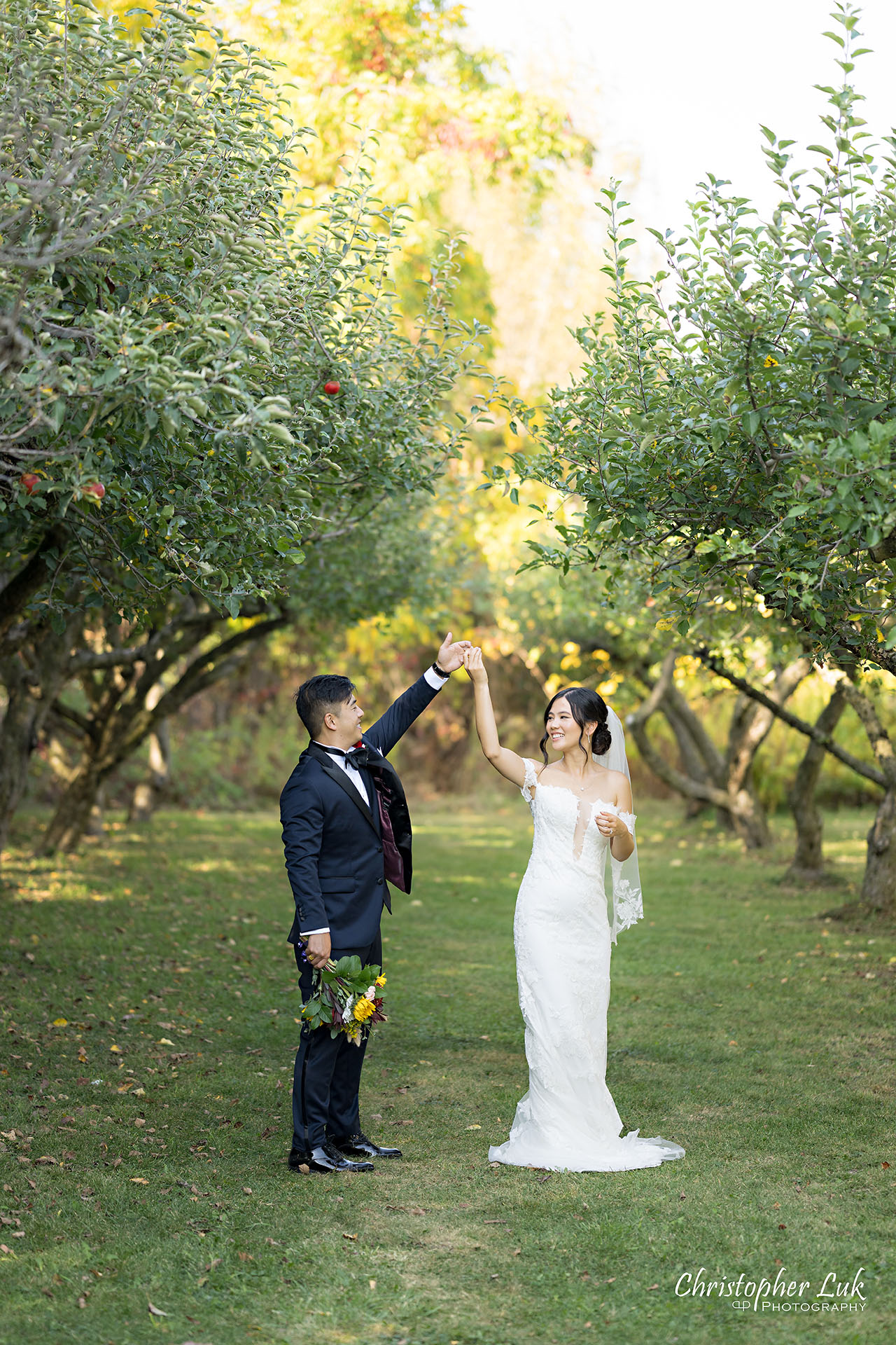 Markham Museum Apple Orchard Applefest Bride Groom Wedding Natural Candid Photojournalistic Organic Dancing Spinning Twirling Together Smile Happy Portrait