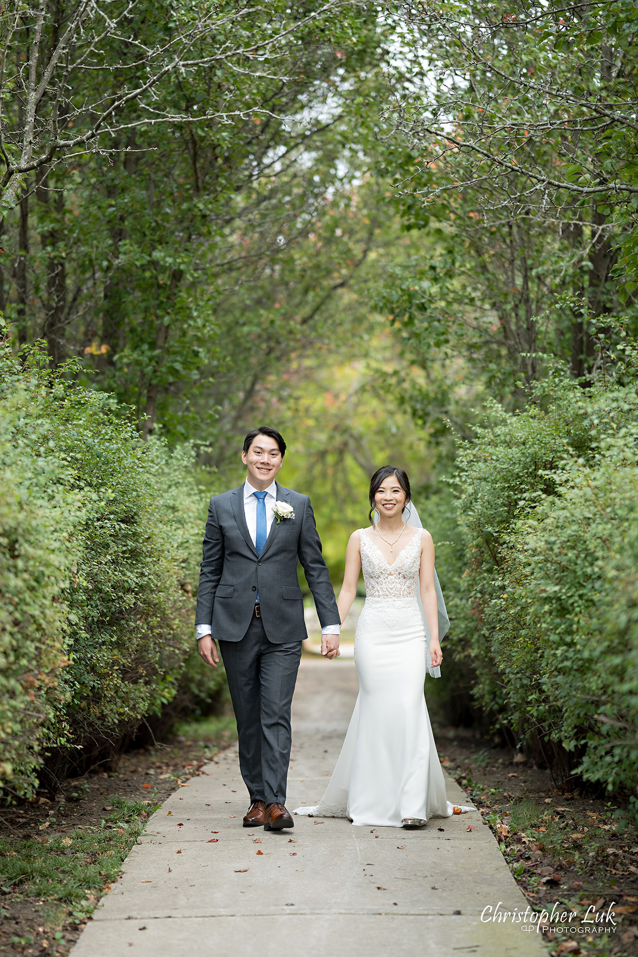 Bride Groom Holding Hands Walking Together Smiling Portrait 