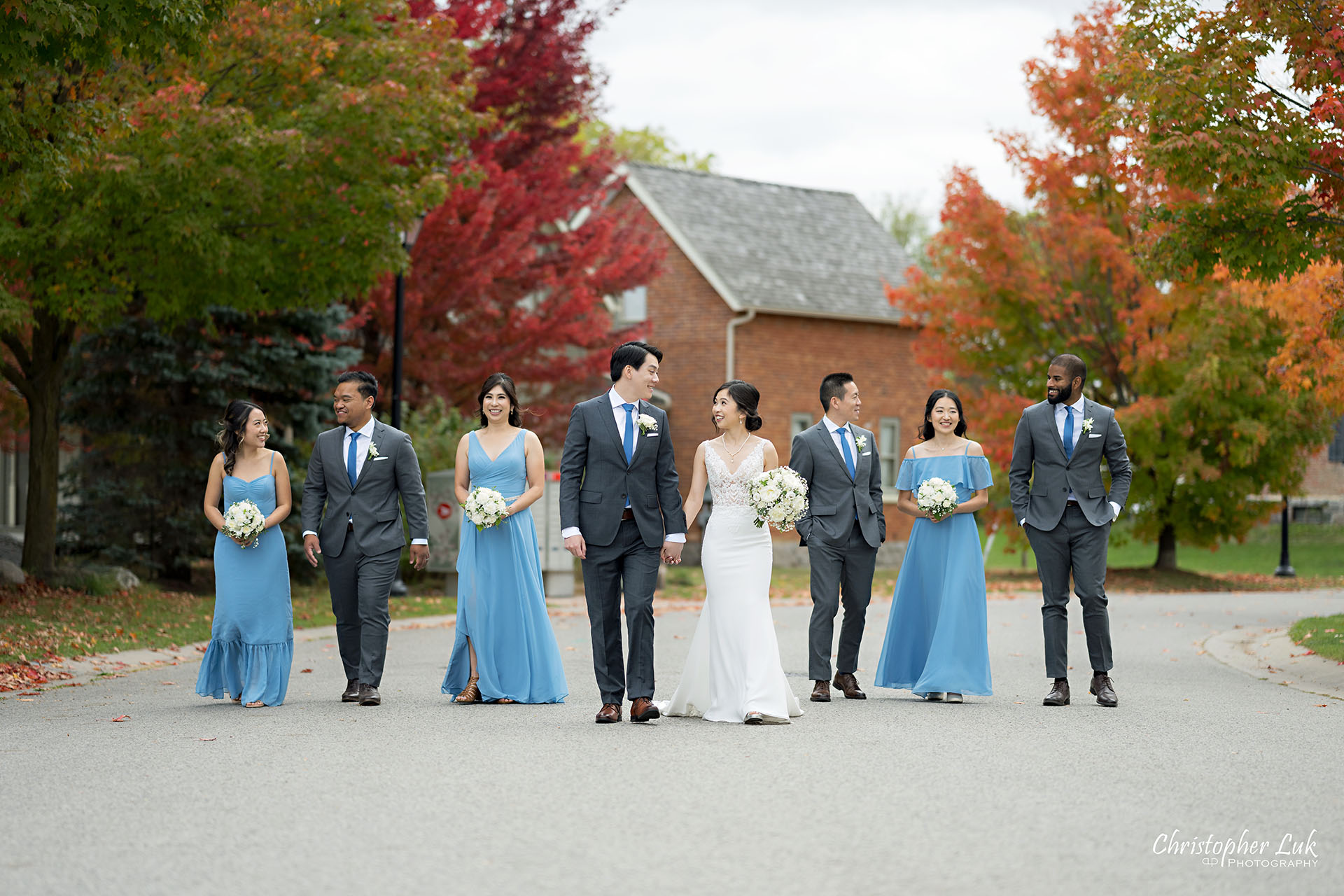 Bride Groom Groomsmen Bridesmaids Bridal Wedding Party Group Photo Crop Autumn Fall Leaves Walking Together Candid Natural Organic Photojournalistic