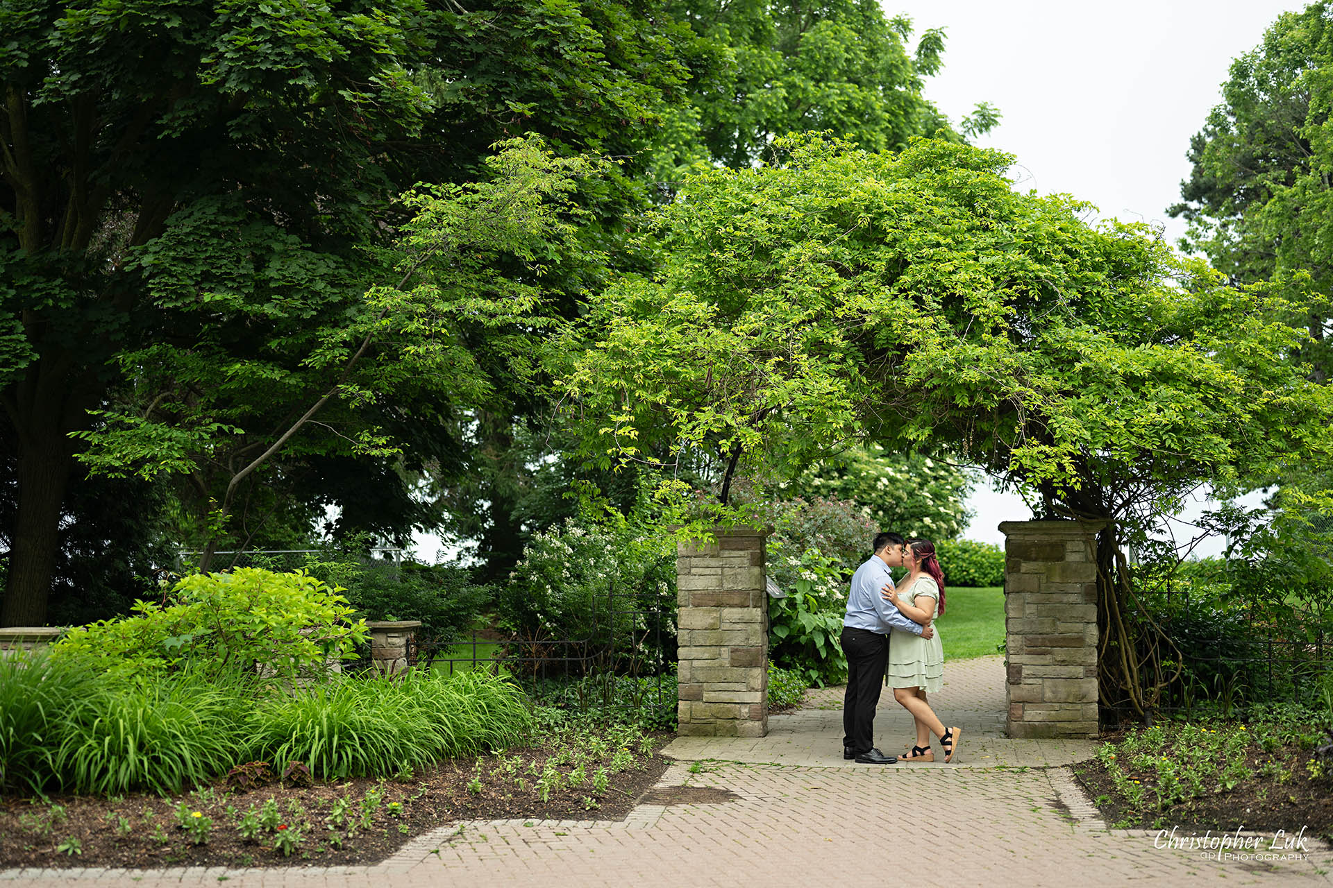 Adamson Estate Tree Leaves Ivy Arch Gate Bride Groom Intimate Hug Kiss 