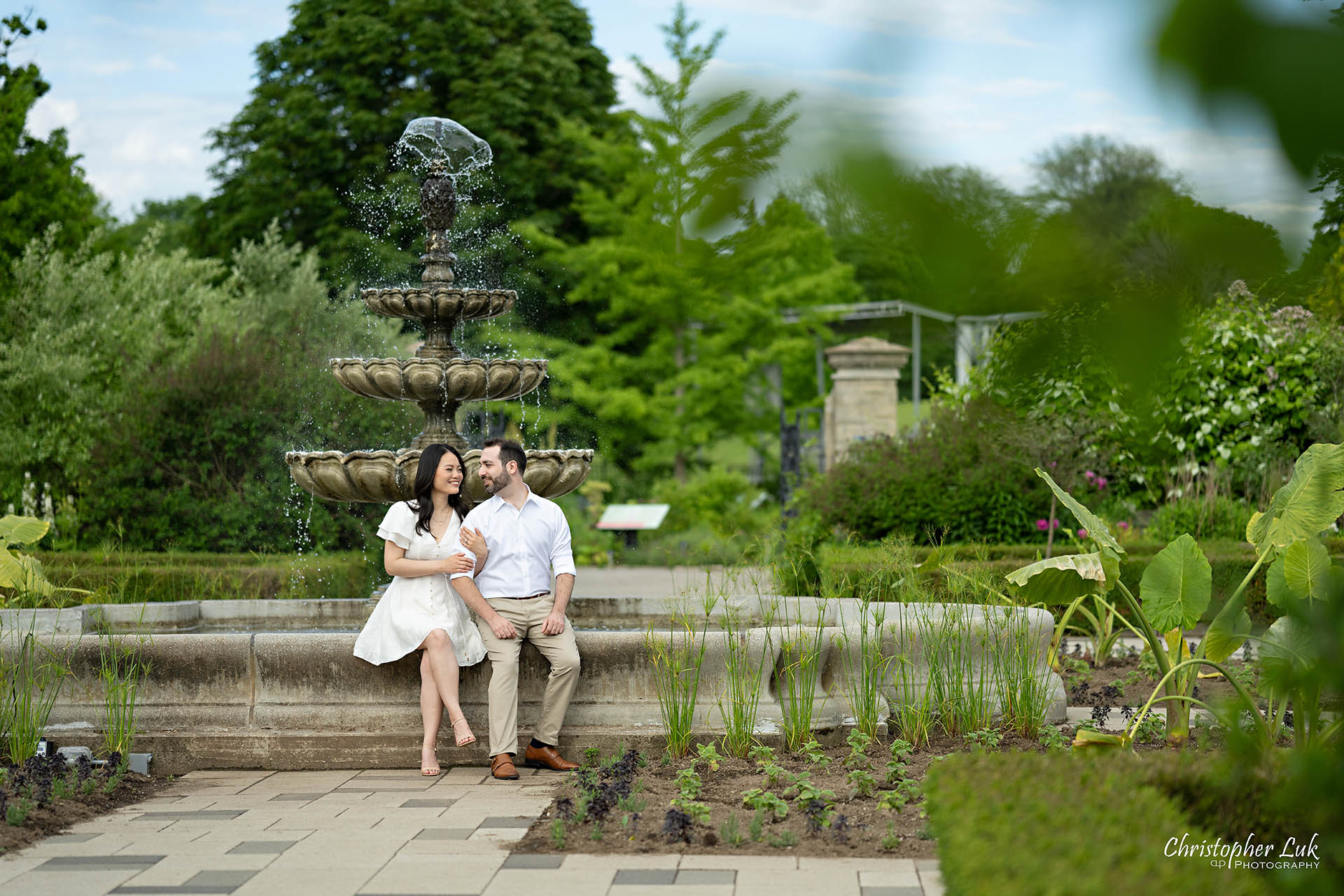 Bride with Groom Candid Natural Photojournalistic Organic Romantic Water Fountain Seated
