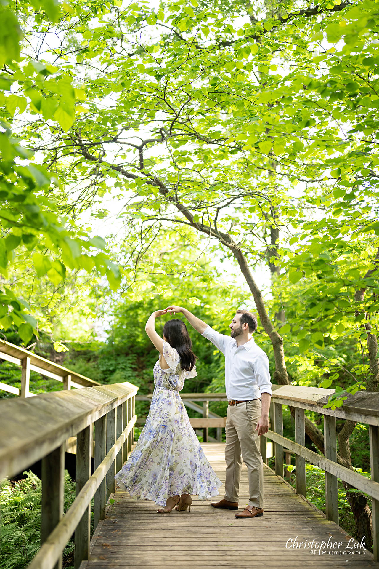 Bride with Groom Boardwalk Forest Woodland Candid Natural Photojournalistic Organic Dancing Spinning Twirling Portrait