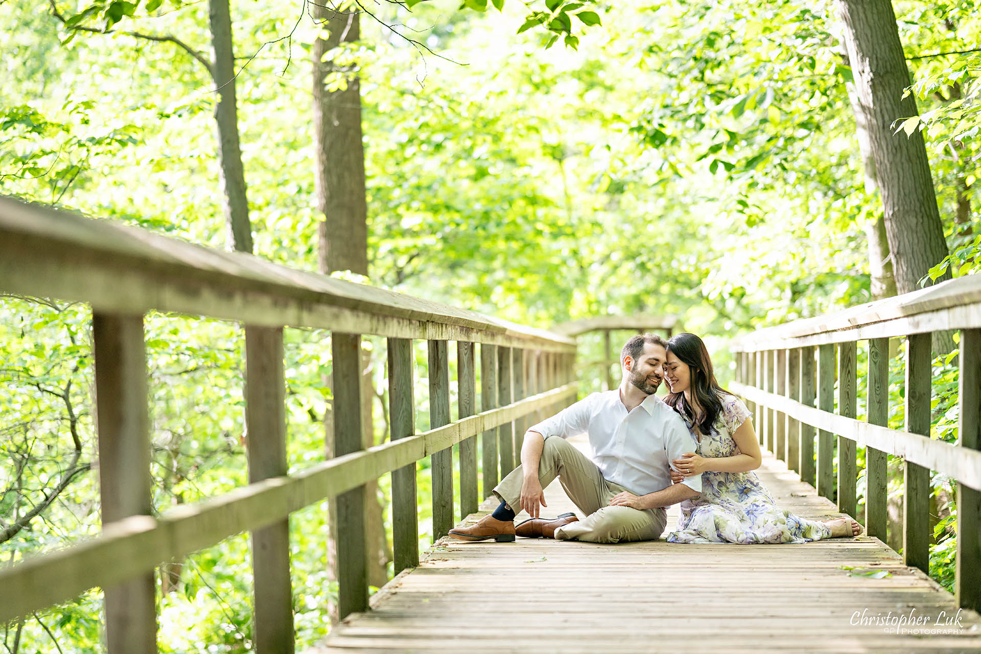 Bride with Groom Sitting Seated Relaxed Together Boardwalk Forest Woodland Candid Natural Photojournalistic Organic