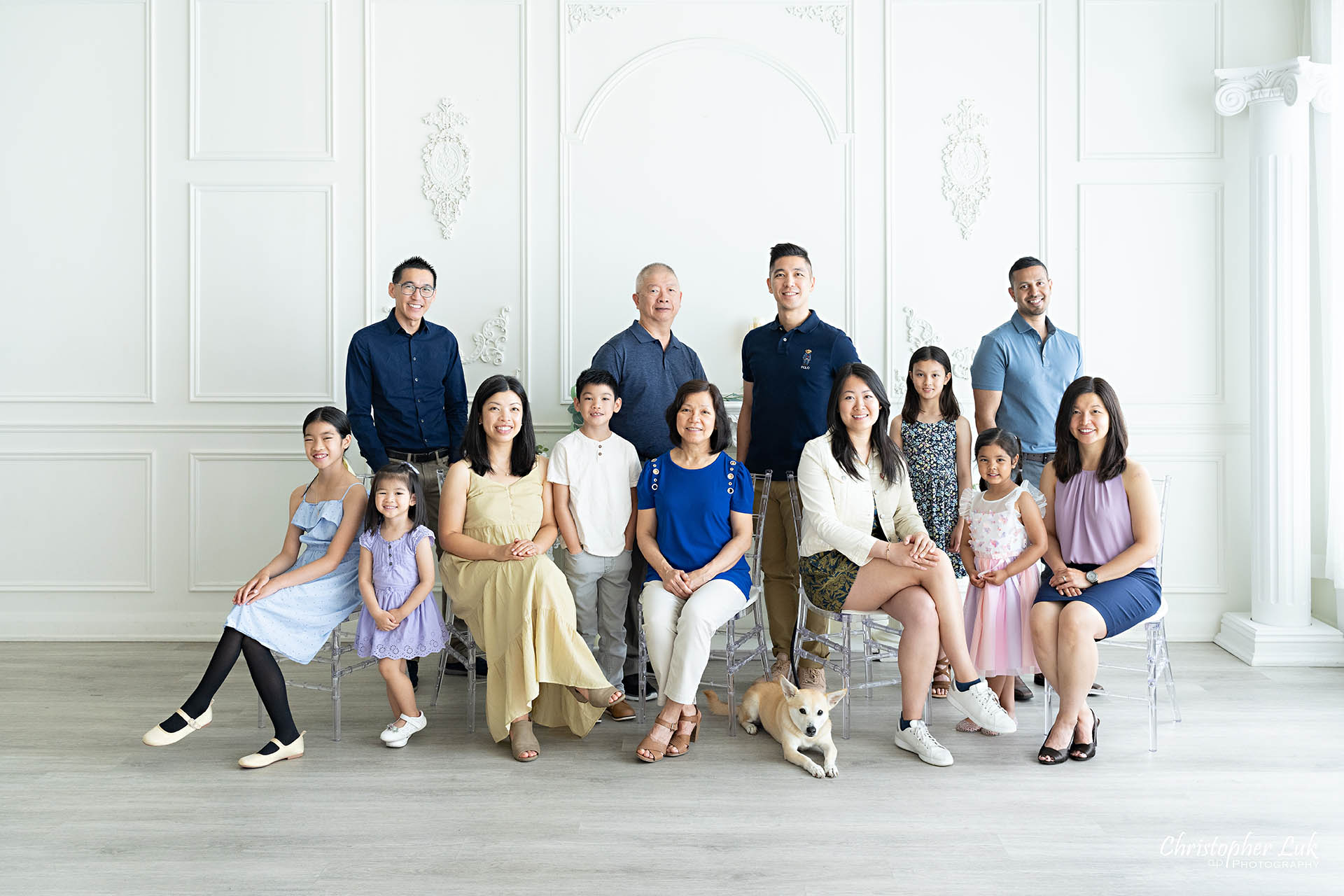 Extended family photo grandparents parents grandchildren posed Toronto natural light photography studio