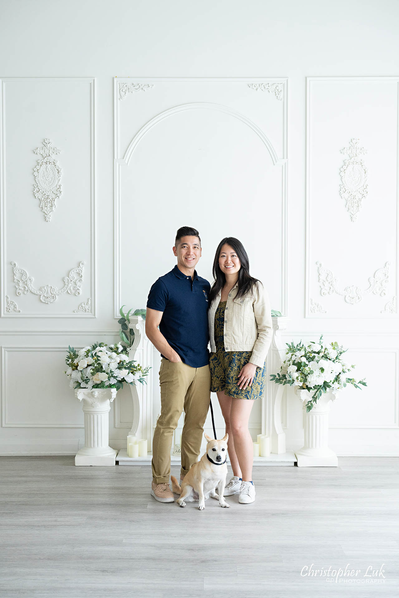 Couple dog family photo posed studio portrait 