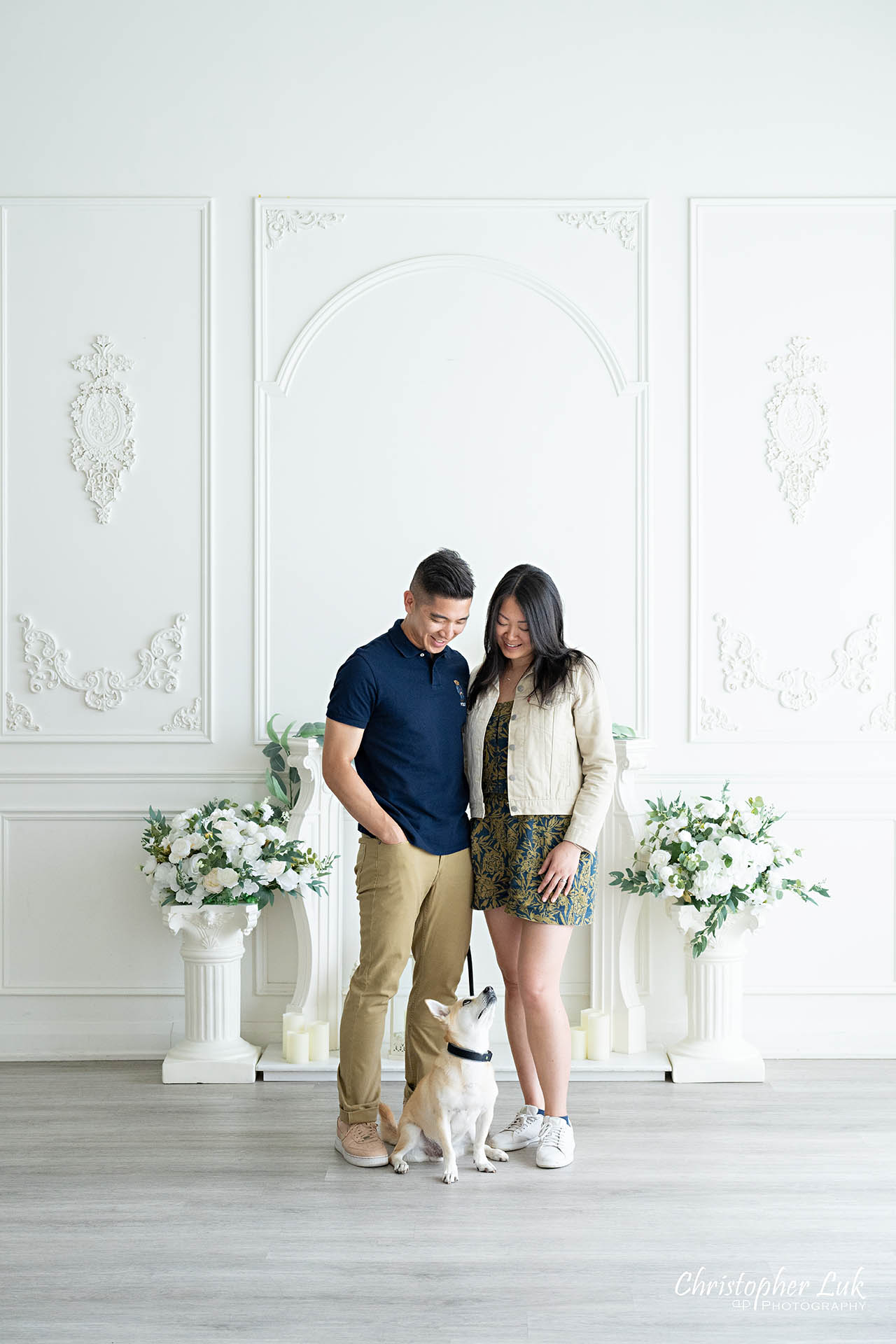 Couple dog family photo posed studio portrait 