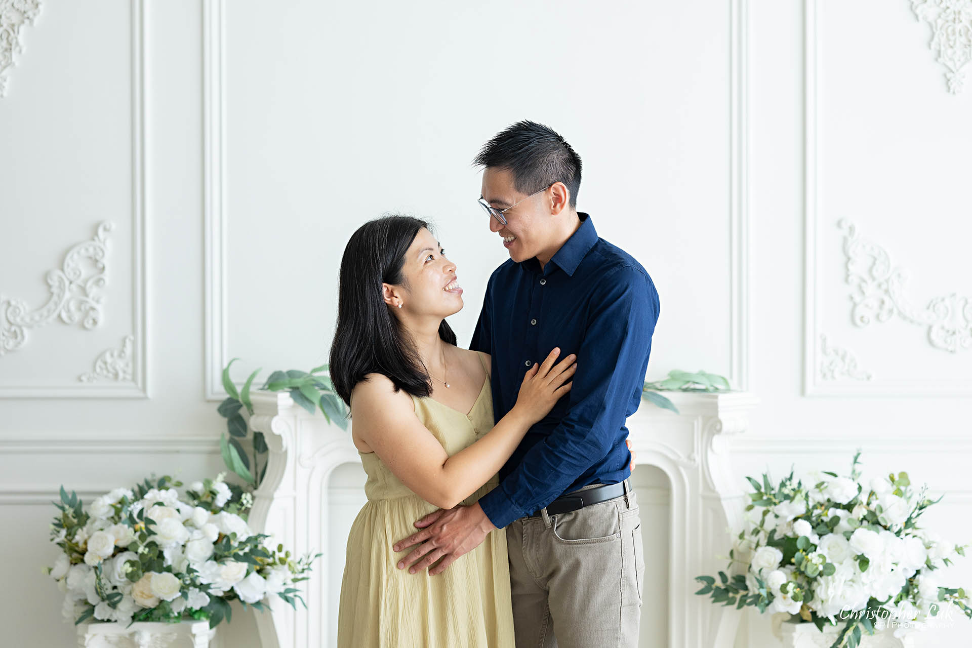 Parents couple family photo Toronto natural light photography studio smile hug