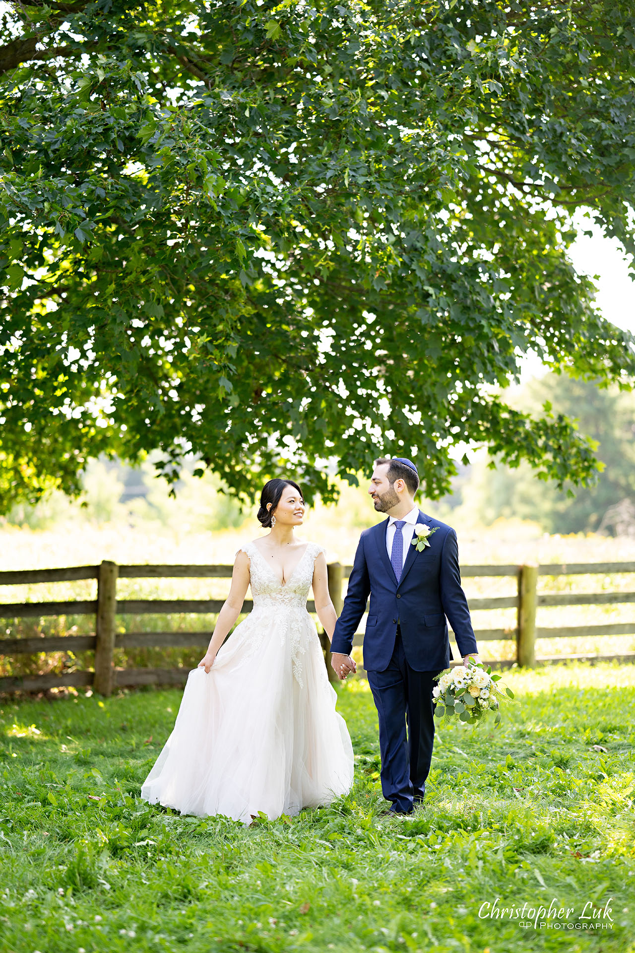 Angus Glen Golf Club Toronto Markham Wedding Bride Groom Smiling Candid Natural Photojournalistic Organic Holding Hands Walking Together