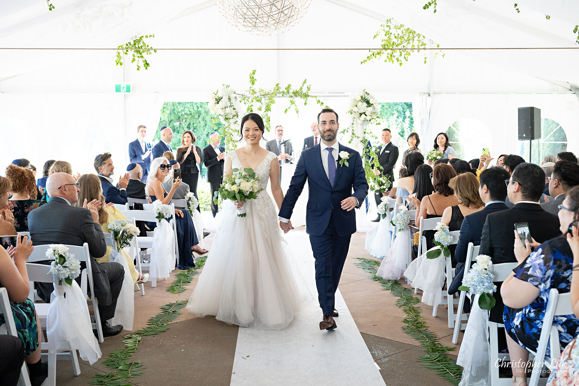 Angus Glen Golf Club Toronto Markham Wedding Event Venue Outdoor White Tent Jewish Chuppah Ceremony Bride Groom Walking Together