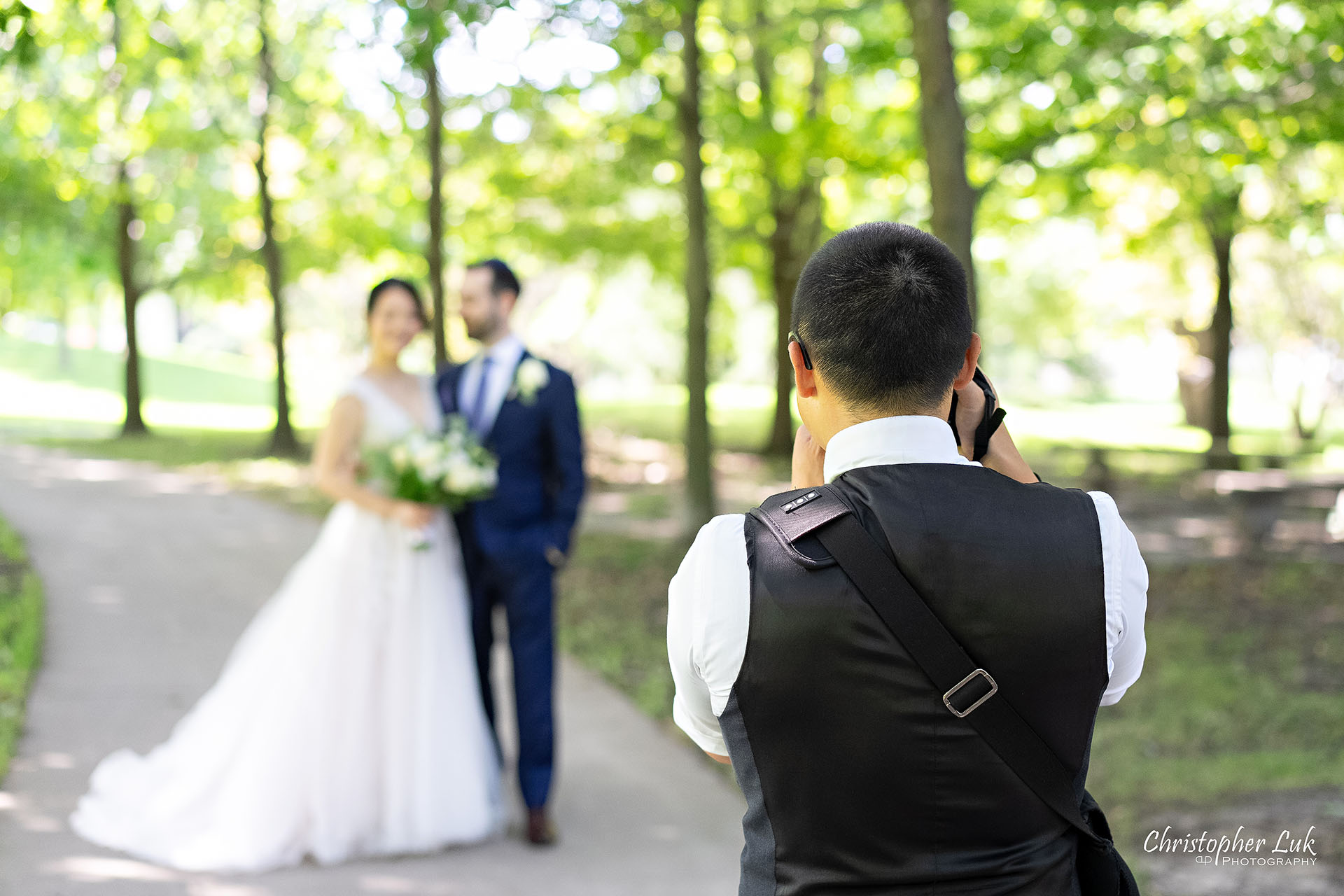 Christopher Luk Toronto Wedding Photographer Behind the Scenes Bride and Groom Taking Pictures