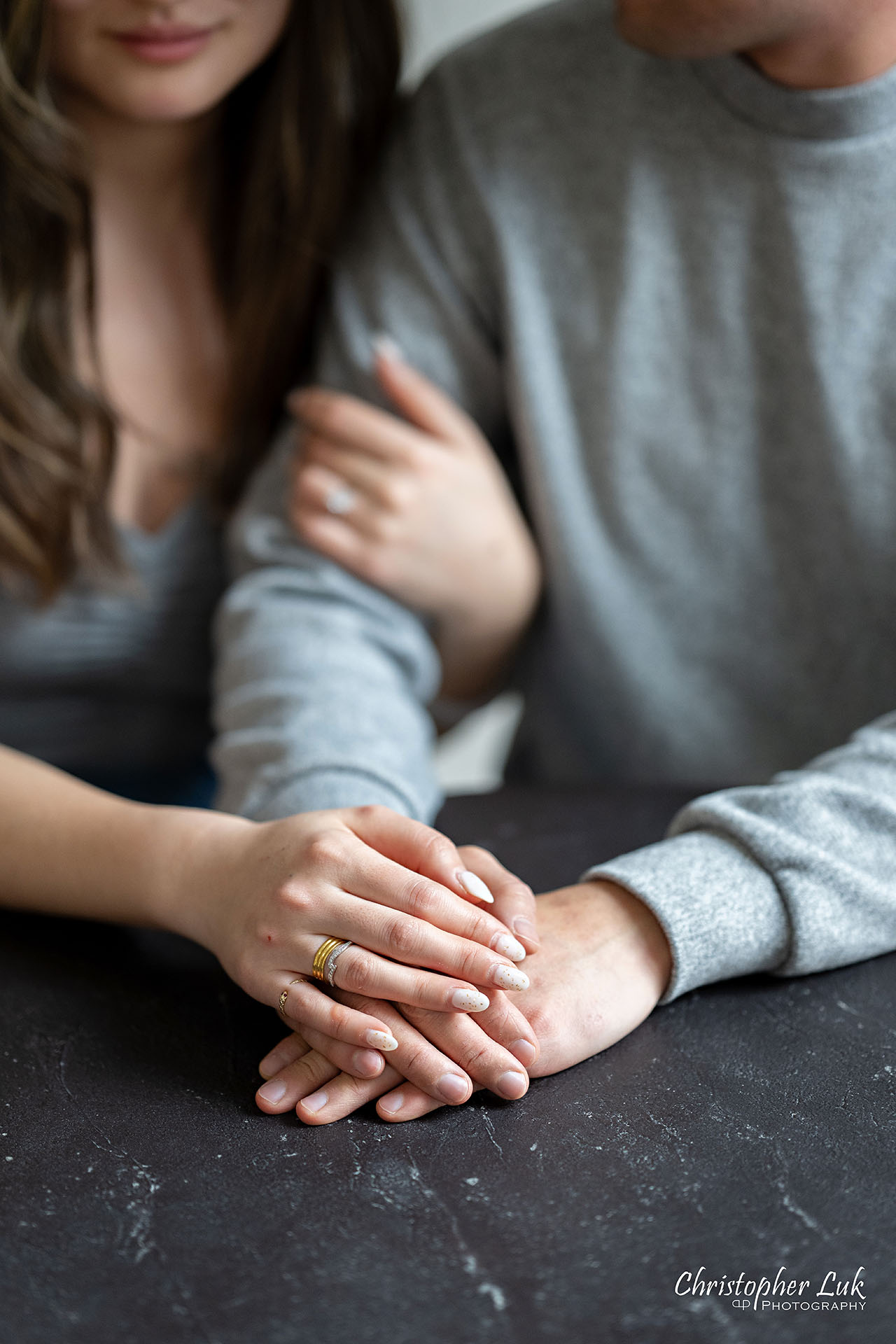 Archive Studios Toronto Surprise Wedding Proposal Bride Groom Candid Natural Organic Photojournalistic Cafe Table Intimate Holding Hands Rings